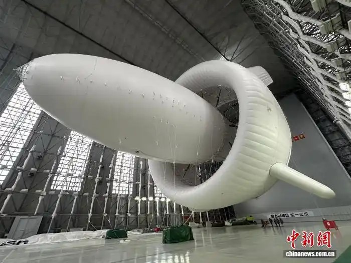 【中国新闻网】探秘中国“空中发电站”：悬停空中“飞艇”向天取电(图1)